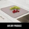 imageGORILLA GRIP 100 BPAFree Patented Silicone Dish Drying Mat for Kitchen Counter 18x16 Inch Water Catching Ribbed Design Easy Clean Waterproof Sink Liner Heat Resistant Fits Under Rack WhiteAlmond