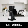 imageGORILLA GRIP BPAFree Rotary Cheese Grater Hand Crank Easy to Set Up Strong Suction Base for Kitchen Countertop Shred Potato Vegetable Nuts in Seconds Round Mandoline Slicer 3 Blades BlackBlack