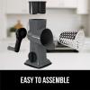 imageGORILLA GRIP BPAFree Rotary Cheese Grater Hand Crank Easy to Set Up Strong Suction Base for Kitchen Countertop Shred Potato Vegetable Nuts in Seconds Round Mandoline Slicer 3 Blades BlackGray