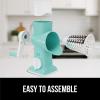 imageGORILLA GRIP BPAFree Rotary Cheese Grater Hand Crank Easy to Set Up Strong Suction Base for Kitchen Countertop Shred Potato Vegetable Nuts in Seconds Round Mandoline Slicer 3 Blades BlackMint
