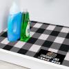 imageGORILLA GRIP LeakGuard NonAdhesive Under Sink Mat for Kitchen Cabinet Waterproof Quick Dry Shelf Liner Durable Absorbent Felt Mats for Bathroom Sinks Cabinets Dresser Easy to Trim 24x30 CharcoalBuffalo Checkered Black White